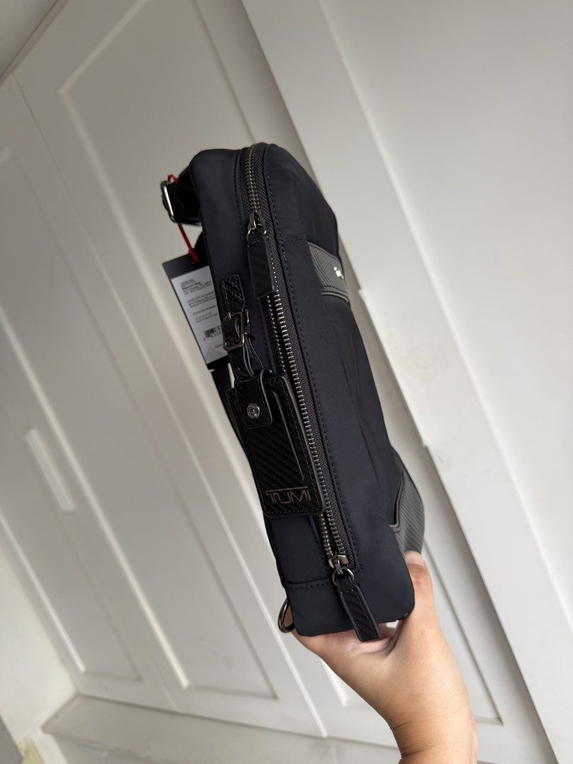 Tumi Ridgeview Sling (Category: Luxury Bags & Wallets) located in Quezon City. Submitted by shopping.eco (Listing ID 1470756517, Image 2). Description: Brand new with tags Authentic Bought in the US Srp $350 + tax Can be gifted. Have a small paperbag. Medyo lagpas nga lang or a large one na sobrang laki naman for it. Rfs: bought 2 different ones for husband and he chose the other one so selling this with no mark up and didnt add the shipping fee 