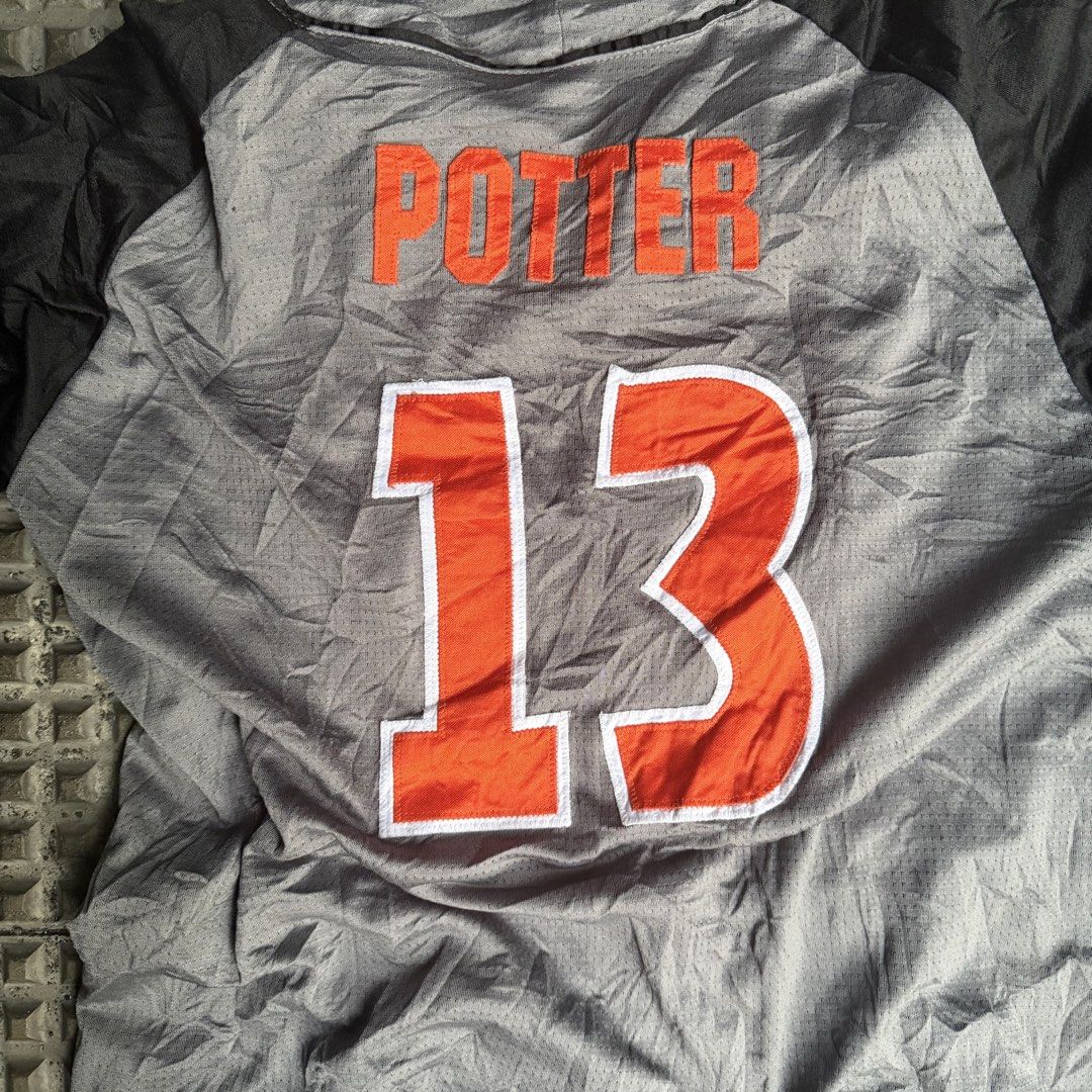 Two Five Orioles Potter #13 Grey Black Baseball Jersey Medium (Category: Activewear) located in Manila. Submitted by marx_g (Listing ID 1470831727, Image 2). Description: - Brand: Two Five Apparel - Style: Baseball jersey with button-down front - Colors: Grey body with black raglan sleeves - Design: Embroidered Orioles script logo on front; Potter #13 on back - Size: Medium - Material: 100% polyester - Origin: Made in the Philippines.