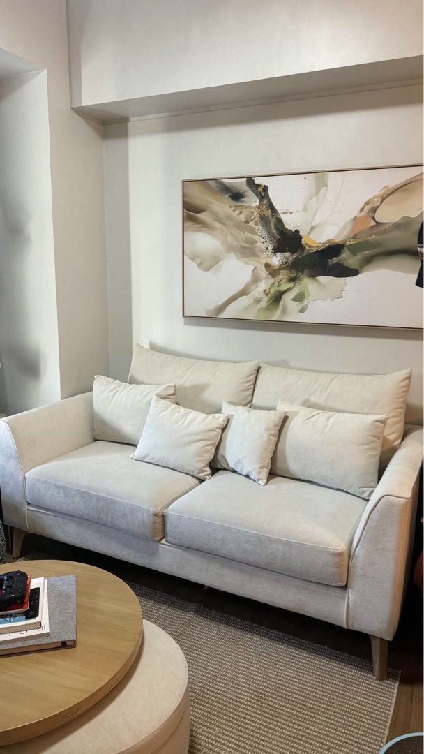 Two Seater Sofa with Pillows (Category: Sofas) located in Marikina City. Submitted by prelovedbybaci (Listing ID 1470824702, Image 1). Description: For Sale: Two Seater Sofa - P35,000 - Size: 73 x 34 x 17” - Material: Semi suede - Made with solid wood and Uratex foam - Newly deep cleaned - Includes all pillows Custom made, bought for 55k RFS: Moved to a bigger unit.