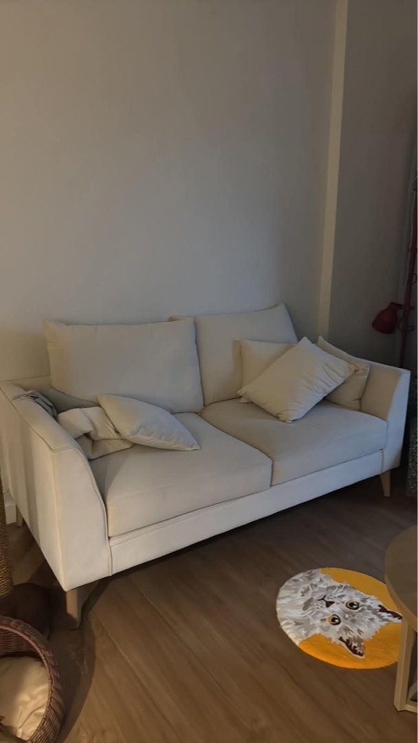 Two Seater Sofa with Pillows (Category: Sofas) located in Marikina City. Submitted by prelovedbybaci (Listing ID 1470824702, Image 2). Description: For Sale: Two Seater Sofa - P35,000 - Size: 73 x 34 x 17” - Material: Semi suede - Made with solid wood and Uratex foam - Newly deep cleaned - Includes all pillows Custom made, bought for 55k RFS: Moved to a bigger unit.