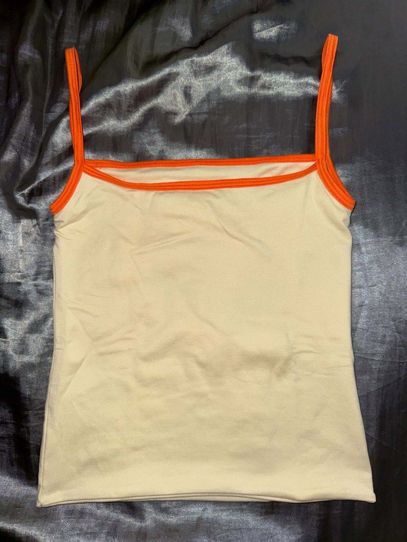 Two toned basic tank top (Category: Sleeveless) located in Manila. Submitted by gryff (Listing ID 1470796381, Image 3). Description: Two toned tank tops for only ₱300 〰️₱120 each, ₱300 for all 3 tank tops 〰️did not use (nilabhan lang po 🥹 nakatago lang sa damitan) 〰️fits xs-s frames (size S) 〰️rfs: decluttering dm if interested!.