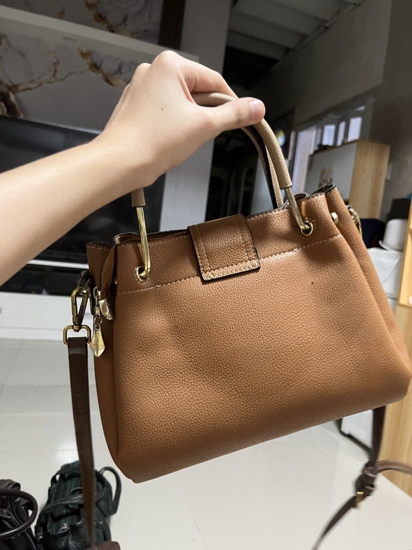 Two-tone Brown Leather Bag with Crossbody Strap (Category: Luxury Bags & Wallets) located in General Trias. Submitted by walterwhiteyo (Listing ID 1470762486, Image 2). Description: see photos for the condition pls.