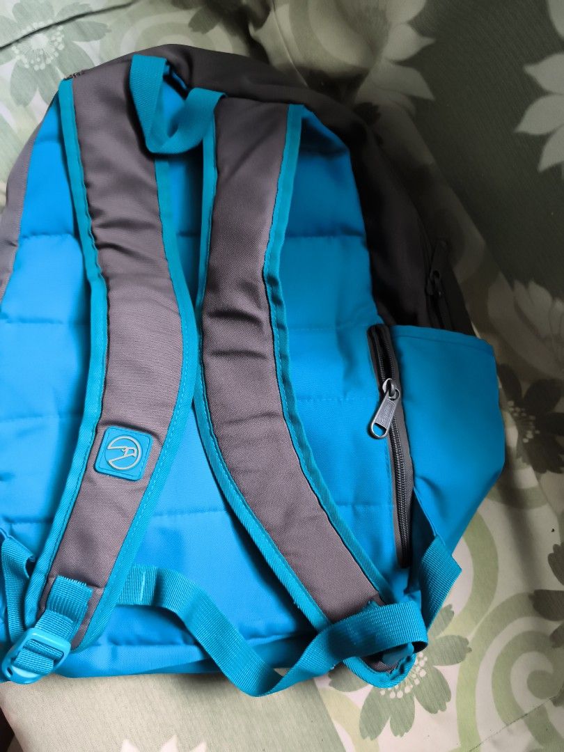 Two-tone Grey and Blue Casual Backpack with Multiple Pockets (Category: Backpacks) located in Bulacan. Submitted by jvblaguard08460 (Listing ID 1470750254, Image 3). Description: - Color: Grey and bright blue - Storage: Spacious main compartment with multiple interior slip pockets and an inner zippered pocket - Pockets: Front zippered pockets for quick access plus a hidden back zippered pocket for security - Comfort: Padded, adjustable shoulder s