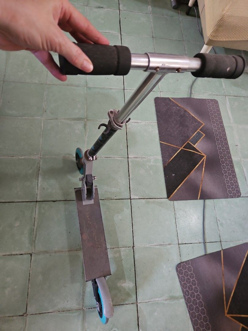 Two-wheel kick scooter with adjustable handlebar (Category: Skates, Rollerblades & Scooters) located in Calamba. Submitted by jingmdejes57879 (Listing ID 1470776979, Image 1). Description: - Standard kick scooter in good working condition - Features a convenient folding mechanism for easy storage - Adjustable handlebar height to fit growing kids or teens - Comfortable foam grips on the T-bar - Metallic deck with grip tape for better footing - Fit