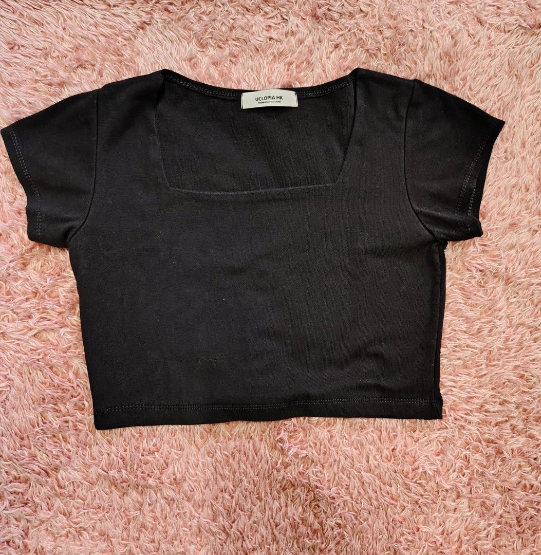 Uclopia HK Black Square Neck Crop Top (Category: Sleeveless) located in Valenzuela. Submitted by anna.banana10 (Listing ID 1470832526, Image 2). Description: - Brand: Uclopia HK (Premium Thailand line) - Style: Fitted crop top with square neckline and short sleeves - Fit: Sits right at the waist - Color: Solid black, highly versatile - Condition: Brand new with tag attached inside collar.