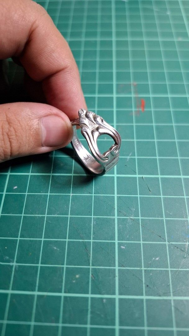 Ucycled Decorative spoon ring Stainless Steel (Category: Rings) located in Valenzuela. Submitted by kneeko (Listing ID 1470876093, Image 3). Description: RINGS MADE FROM CUTLERY/KUBYERTOS Size (Inner Diameter) : approx. 21mm DIY rings from various types of cutlery sourced from ukays and surplus shops. Quality can vary, but will indicate flaws. Material is stainless steel. LAST PRICE POSTED! Colors of the item are not accurate to the photo due to 