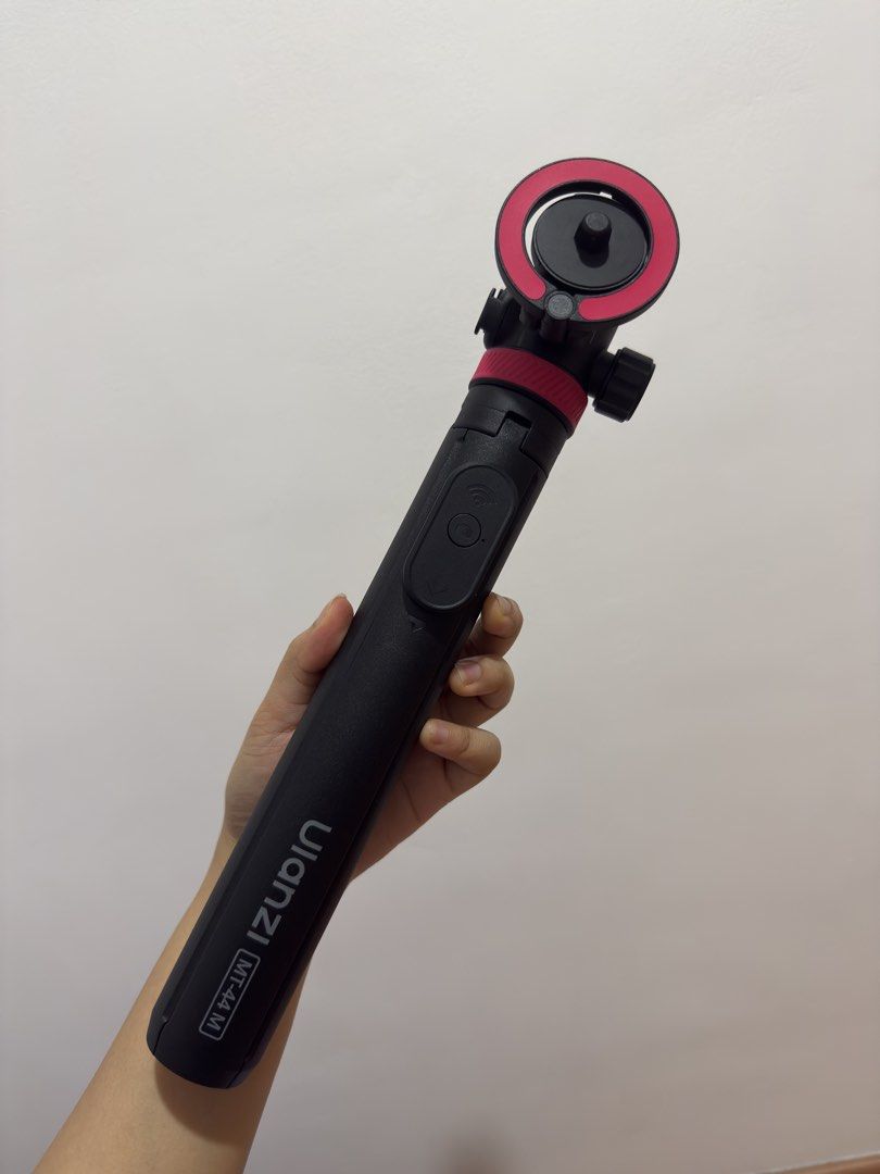 Ulzani Mag safe tripod with bluetooth remote (Category: Tripods & Monopods) located in Manila. Submitted by clarisse12 (Listing ID 1470873179, Image 1). Description: Just opened the box to test - with bluetooth remote -dual device set up -1.49 m height - Magnetic mount and screw mount MOP: Gcash or BPI MOD: lalamove to be shouldered by buyer LOC: BGC.