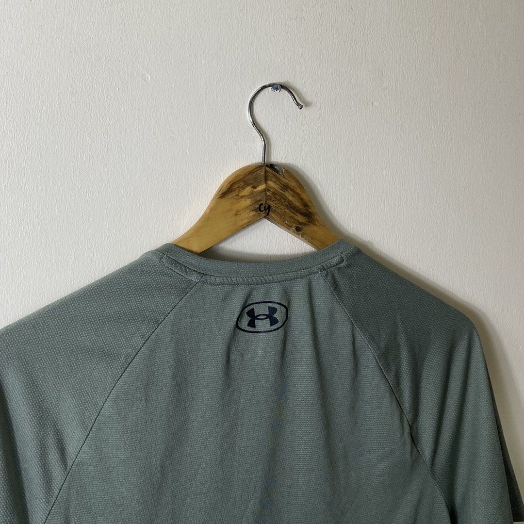 Under Armour The Tech Tee Green Small (Category: Activewear) located in Manila. Submitted by carbertjakosalem (Listing ID 1470921413, Image 3). Description: - Brand: Under Armour - Item: The Tech Tee - Color: Green - Size: Small - Fit: Loose fit with short sleeves and raglan seams - Logos: Small UA logo on chest and back collar - Material: 100% lightweight polyester - Ideal for: Workouts or casual everyday wear.