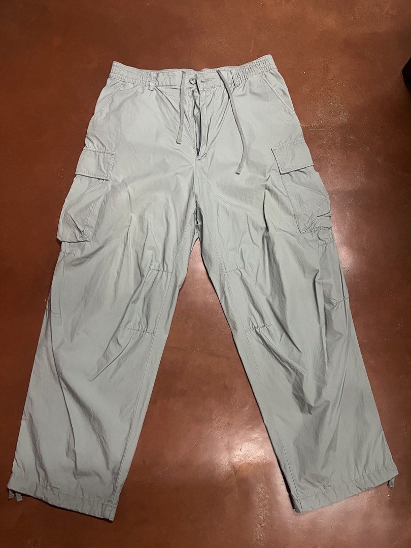 Uniqlo Cargo Pants Light Grey Size L (Category: Trousers) located in Davao. Submitted by dwprwyn (Listing ID 1470885515, Image 1). Description: - Brand: Uniqlo - Item: Utility Cargo Pants - Color: Light Grey - Size: L - Material: 100% cotton body - Waist: Elastic waistband with drawstring closure - Pockets: Multiple side and back cargo pockets - Hem: Adjustable drawstrings to change the fit - Style: Relaxed streetwear, highly versatile and comfor