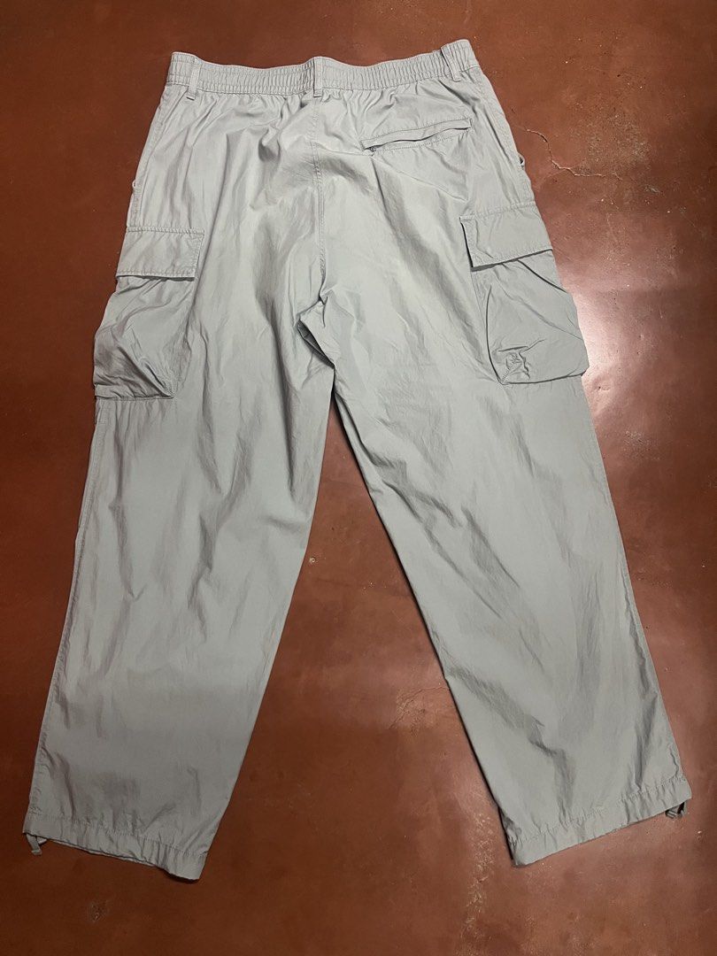 Uniqlo Cargo Pants Light Grey Size L (Category: Trousers) located in Davao. Submitted by dwprwyn (Listing ID 1470885515, Image 2). Description: - Brand: Uniqlo - Item: Utility Cargo Pants - Color: Light Grey - Size: L - Material: 100% cotton body - Waist: Elastic waistband with drawstring closure - Pockets: Multiple side and back cargo pockets - Hem: Adjustable drawstrings to change the fit - Style: Relaxed streetwear, highly versatile and comfor