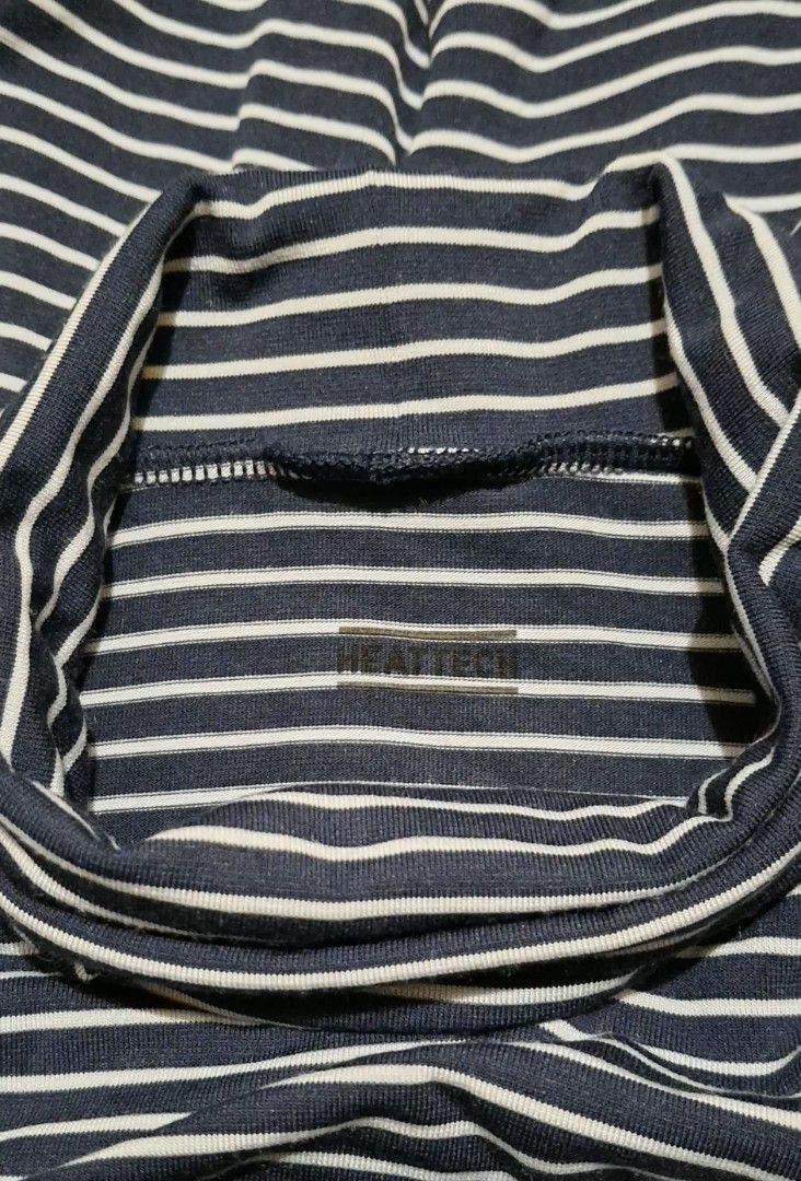 Uniqlo Heattech with navy blue & white striped pattern (Category: Others Tops) located in Caloocan City. Submitted by haydee88 (Listing ID 1470931268, Image 3). Description: 🍒turtleneck.