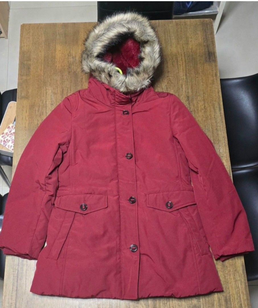 Uniqlo Ultra Warm Down Short Coat Red (Category: Coats, Jackets and Outerwear) located in Caloocan City. Submitted by conjestion (Listing ID 1470808401, Image 3). Description: - Brand: Uniqlo - Item: Ultra Warm Down Short Coat - Color: Red - Size: L (fits true to size) - Hood: Features removable faux fur trim - Lining: Fully lined with soft, cozy reddish faux fur inside - Closure: Front zipper and button closure - Pockets: Deep front pockets with