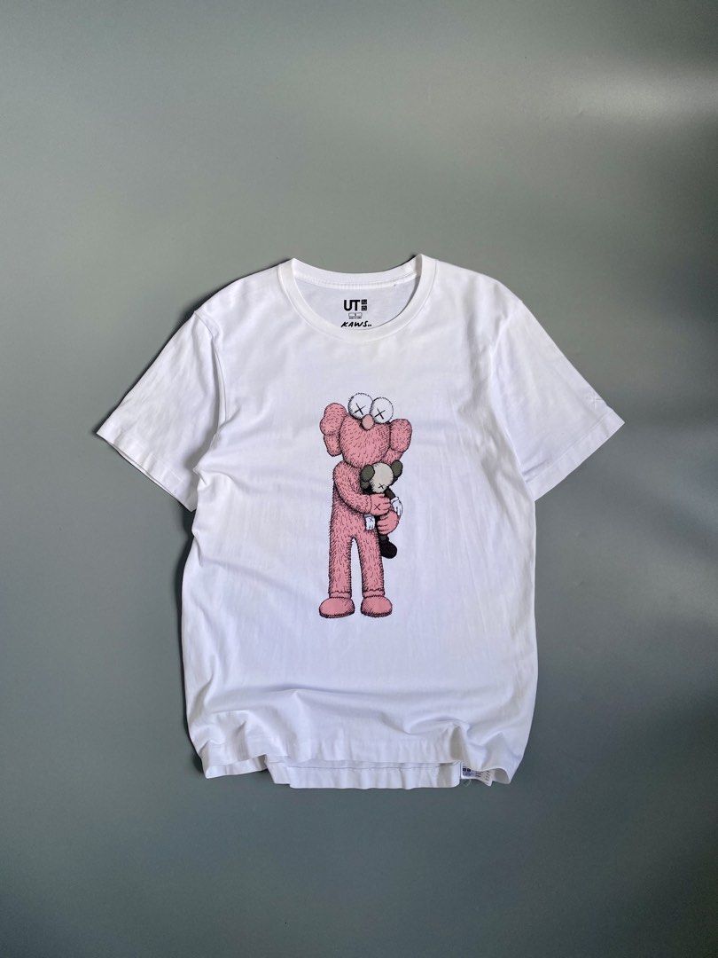 Uniqlo UT x KAWS White Tee Size S (Category: Shirts) located in Cavite. Submitted by awuuu27 (Listing ID 1470748191, Image 1). Description: UN!QL0 X K@WS €LM0 Tee 💎 DIMES: Width-19.5/Length-27(M) CONDITION: 9/10 COLOR RATE: 9/10 ISSUE: needwash .