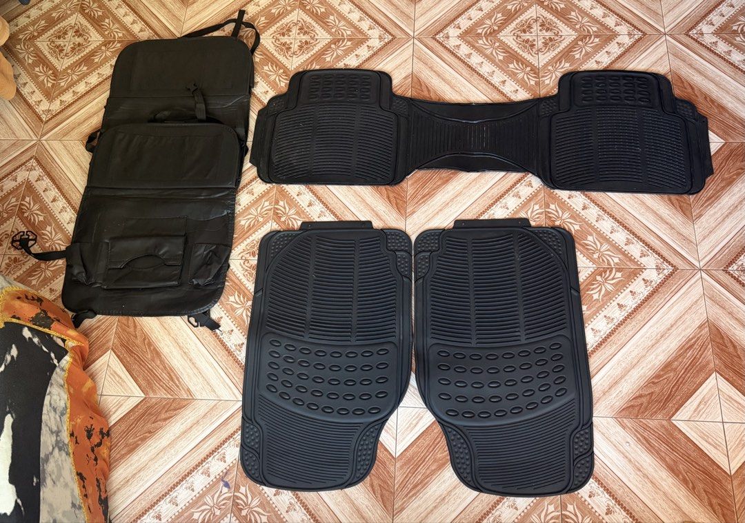 Universal Rubber Car Mat & Seat Organizer (Category: Upholstery, Seatcovers and Other Interior Parts and Accessories) located in Mabalacat. Submitted by ladybugxx (Listing ID 1470744131, Image 1). Description: - Complete set: Universal rubber car mats and 2pcs back-seat organizer - Color: Classic black - Material: Heavy-duty, waterproof rubber and durable fabric - Features: Anti-slip design mats, easy to wash, multiple pockets for car essentials 