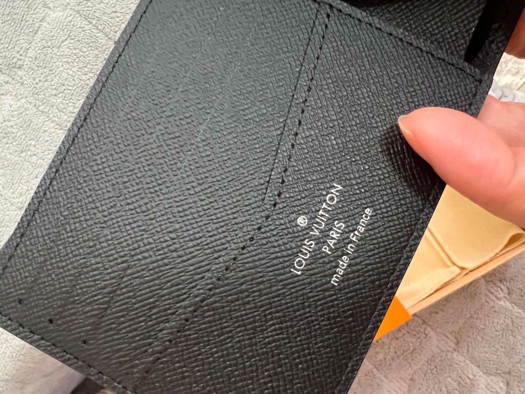 Unused Louis Vuitton Monogram Eclipse Slender Wallet (Category: Luxury Bags & Wallets) located in Quezon City. Submitted by hellopatchi (Listing ID 1470750911, Image 3). Description: Lv bifold wallet unused microchip With dustbag, box and paper bag Authentic Louis Vuitton Slender wallet - Monogram Eclipse canvas with black leather interior - Made in France stamp clearly visible - Multiple card slots for everyday essentials - Never used, pristine 