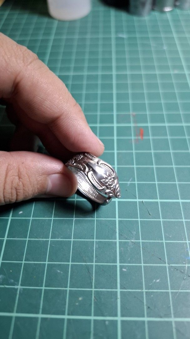 Upcycled Spoon Ring Decorative Stainless Steel (Category: Rings) located in Valenzuela. Submitted by kneeko (Listing ID 1470876385, Image 3). Description: RINGS MADE FROM CUTLERY/KUBYERTOS Size (Inner Diameter) : approx. 21mm DIY rings from various types of cutlery sourced from ukays and surplus shops. Quality can vary, but will indicate flaws. Material is stainless steel. LAST PRICE POSTED! Colors of the item are not accurate to the photo due to