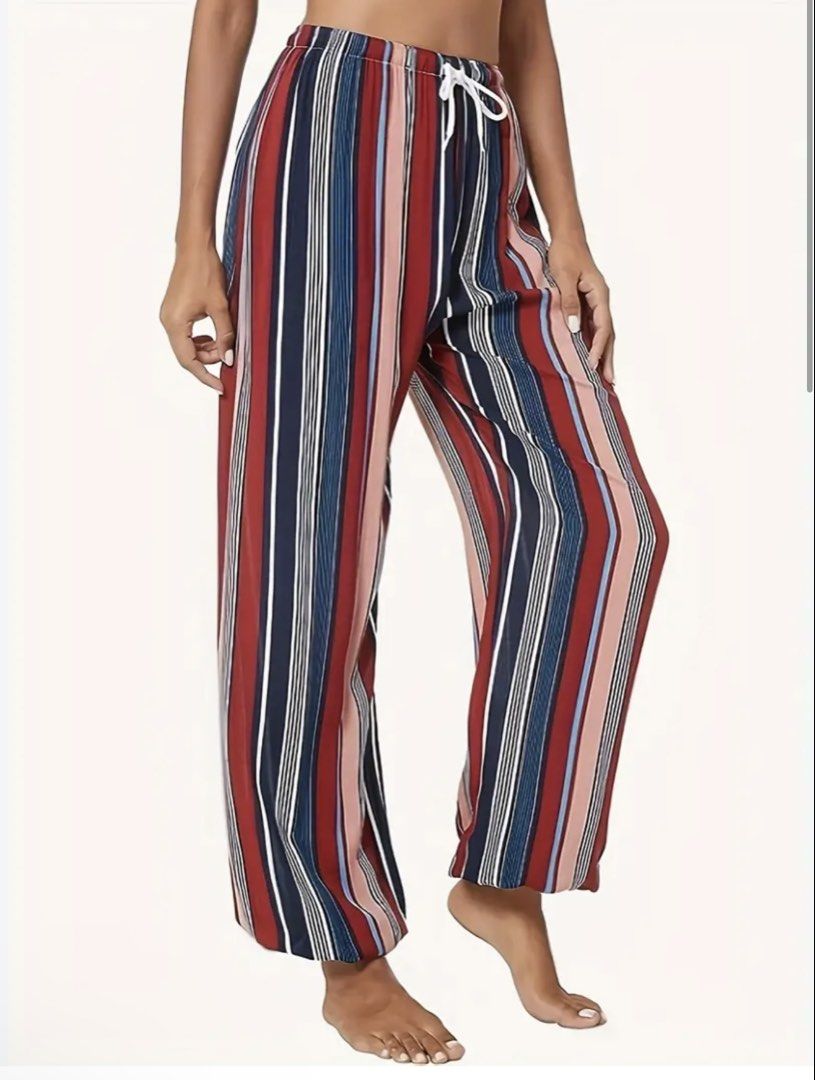 Urban Coco Colorful Stripes Jogger Pants (Category: Other Bottoms) located in Antipolo. Submitted by harlowwillow (Listing ID 1470743305, Image 2). Description: NO TO LOW BALLERS XL on tag W 16-21” L 43” Soft flowy material - Multi-color striped pants with a trendy vertical pattern (Red, navy blue, peach, and white) - Comfortable elastic waistband with an adjustable white drawstring tie - Cuffed ankles with elastic hem for a snug fit - Lightweigh