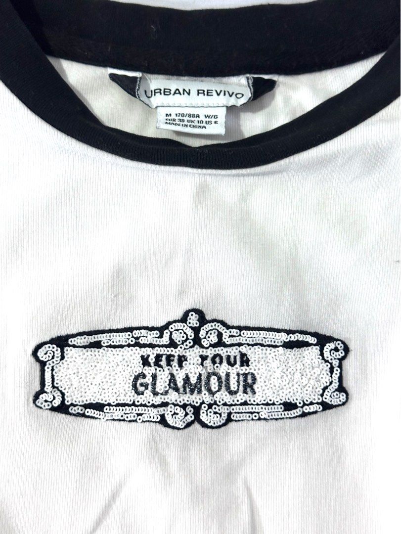 Urban Revivo Ringer Tee “ KEEP YOUR GLAMOUR” (Category: Shirts) located in Antipolo. Submitted by shopaho_nique (Listing ID 1470779695, Image 2). Description: 👗 PRELOVED FOR SALE: Urban Revivo Ringer Tee ✨ Price: ₱150 ONLY! ✨ Condition: Preloved / Lightly Used (Still in great condition!) ✨ Brand: Urban Revivo (UR) Authentic ✨ Size: Medium (Fits Small to Medium / EUR 38, UK 10, US 6) ( Approx.: 17”L x 17”W Pit to pit 20”) ✨ Color/Design: White wi