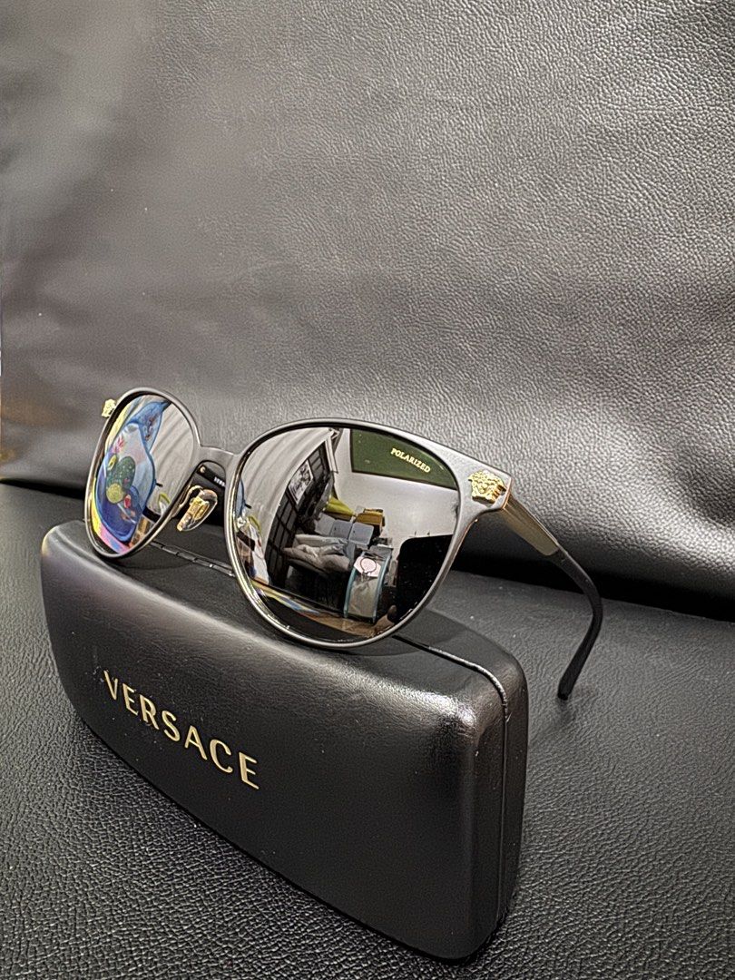 Versace Polarized Sunglasses with Case (Category: Sunglasses & Eyewear) located in Quezon City. Submitted by saynic (Listing ID 1470862180, Image 1). Description: Good as new RFS: already bought another one Polarised sunglasses Bought from USA .