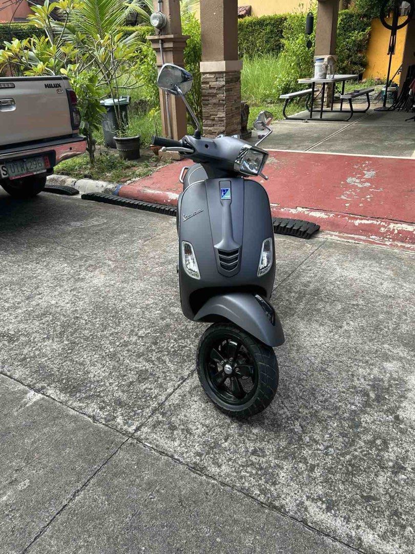 Vespa S Matt Grey Scooter (Category: Skates, Rollerblades & Scooters) located in Manila. Submitted by aaronalejandro16 (Listing ID 1470906001, Image 1). Description: - Model: Vespa S Scooter - Color: Matte Grey - Mileage: 5,212 km - Design: Classic rectangular headlight, black alloy wheels, and comfortable black seat with white piping - Condition: Clean body, runs smoothly - Usage: Ideal for daily city commutes or weekend leisure rides.