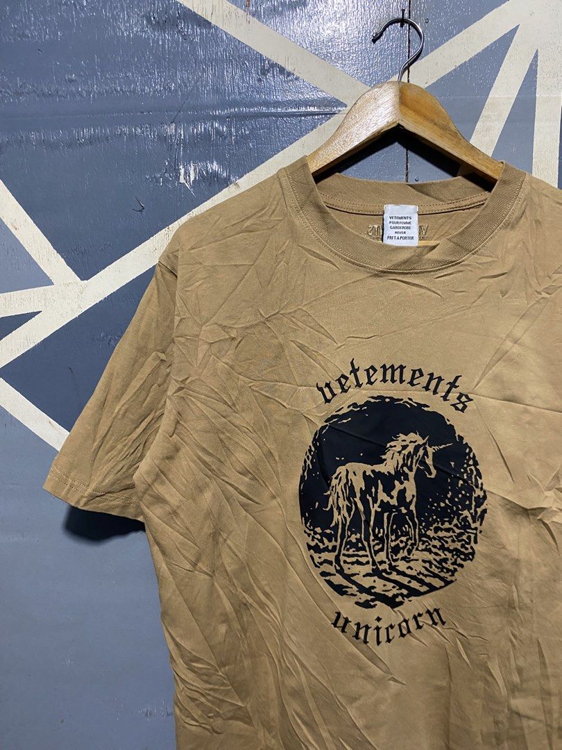 Vetemets Unicorn Edition Brown T-Shirt (Category: Tshirts & Polo Shirts ) located in Polomolok. Submitted by marrssz (Listing ID 1470744067, Image 3). Description: - Brand: Vetemets Unicorn Edition - Color: Brown - Fit: Relaxed everyday fit with short sleeves and crew neck - Material: Heavy cotton - Details: Bold black unicorn graphic on front and back, with embroidered text near the back collar - Style: Great piece for streetwear looks -DIMES [2
