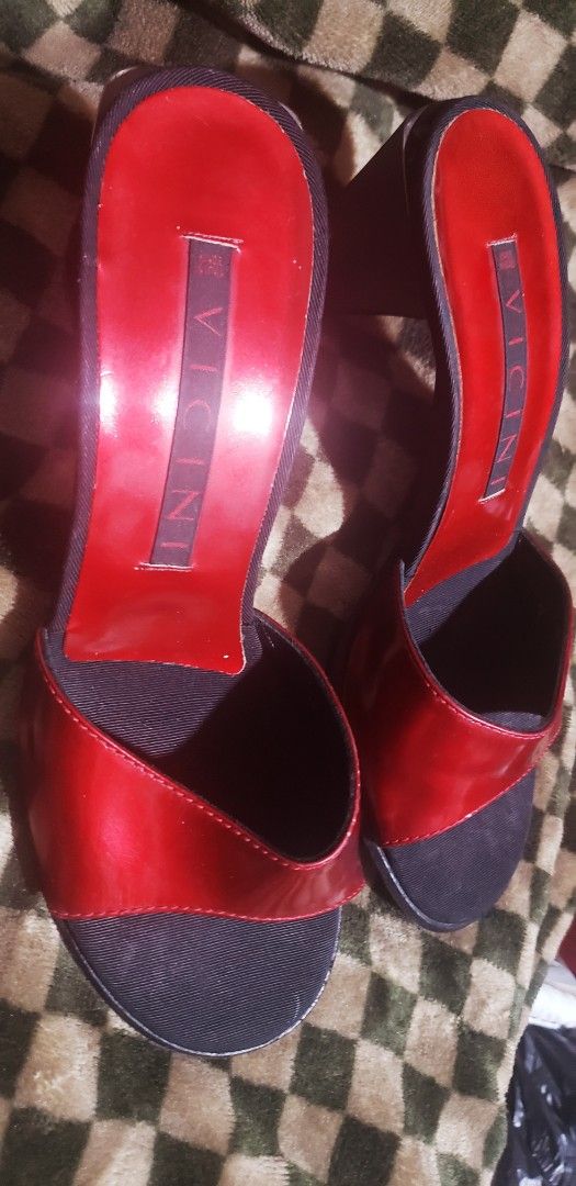 Vicini Red Patent Leather Block Heel Mules (Category: Heels) located in Marikina City. Submitted by racoon143 (Listing ID 1470826225, Image 1). Description: - Brand/Model: Vicini red patent leather mules - Size: 37.5 (Made in Italy) - Material: Genuine leather with glossy red insoles - Design: Slip-on style with black straps and comfortable chunky block heels - Condition: Moderate wear on outsoles, perfectly versatile for casual or dressed-up loo
