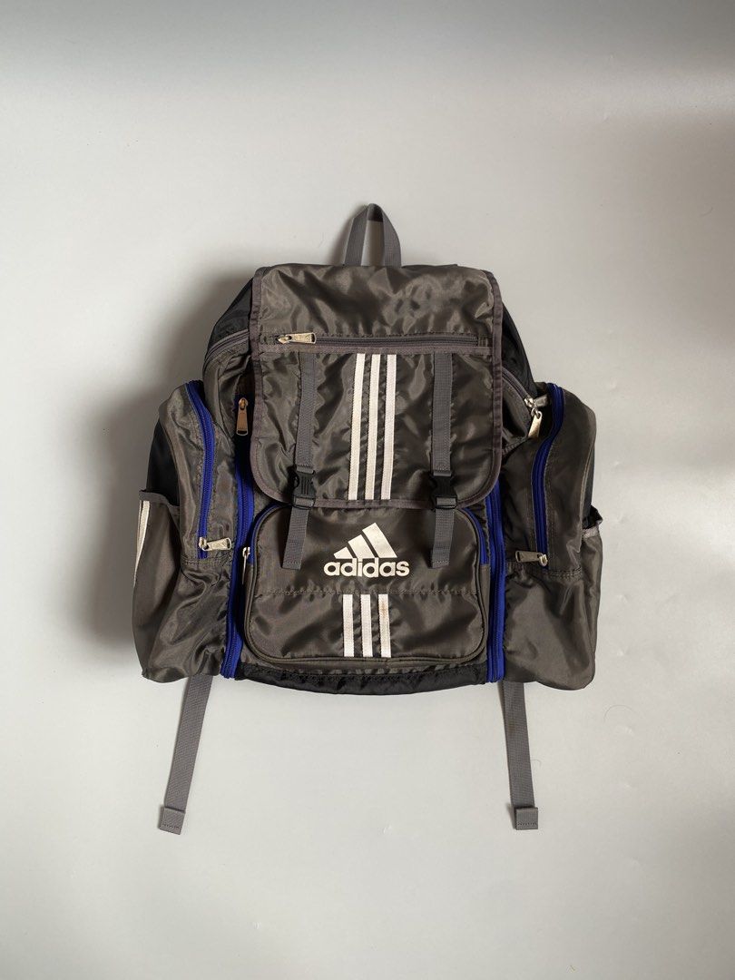 Vintage Adidas Gray and Blue Backpack with Three Stripes (Category: Backpacks) located in Cavite. Submitted by awuuu27 (Listing ID 1470747017, Image 1). Description: @D!D@S Backpack Bag 💎 CONDITION: 9/10 COLOR RATE: 9/10 ISSUE: needwash, sunfade(back part only) .