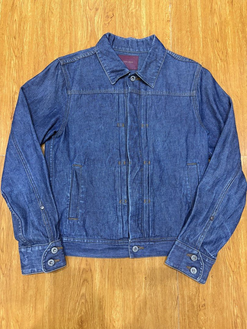 Vintage Bossini Jeans Denim Jacket (Category: Coats, Jackets and Outerwear) located in Angeles City. Submitted by lozmorlan (Listing ID 1470882877, Image 1). Description: - Brand/Item: Bossini Denim Jacket - Wash: Classic blue with contrast orange stitching - Size: 11 (Interior label) - Details: Structured front pleats, button cuffs, and branded metal buttons - Material: Sturdy, high-quality denim - Condition: Great wardrobe staple for cooler wea
