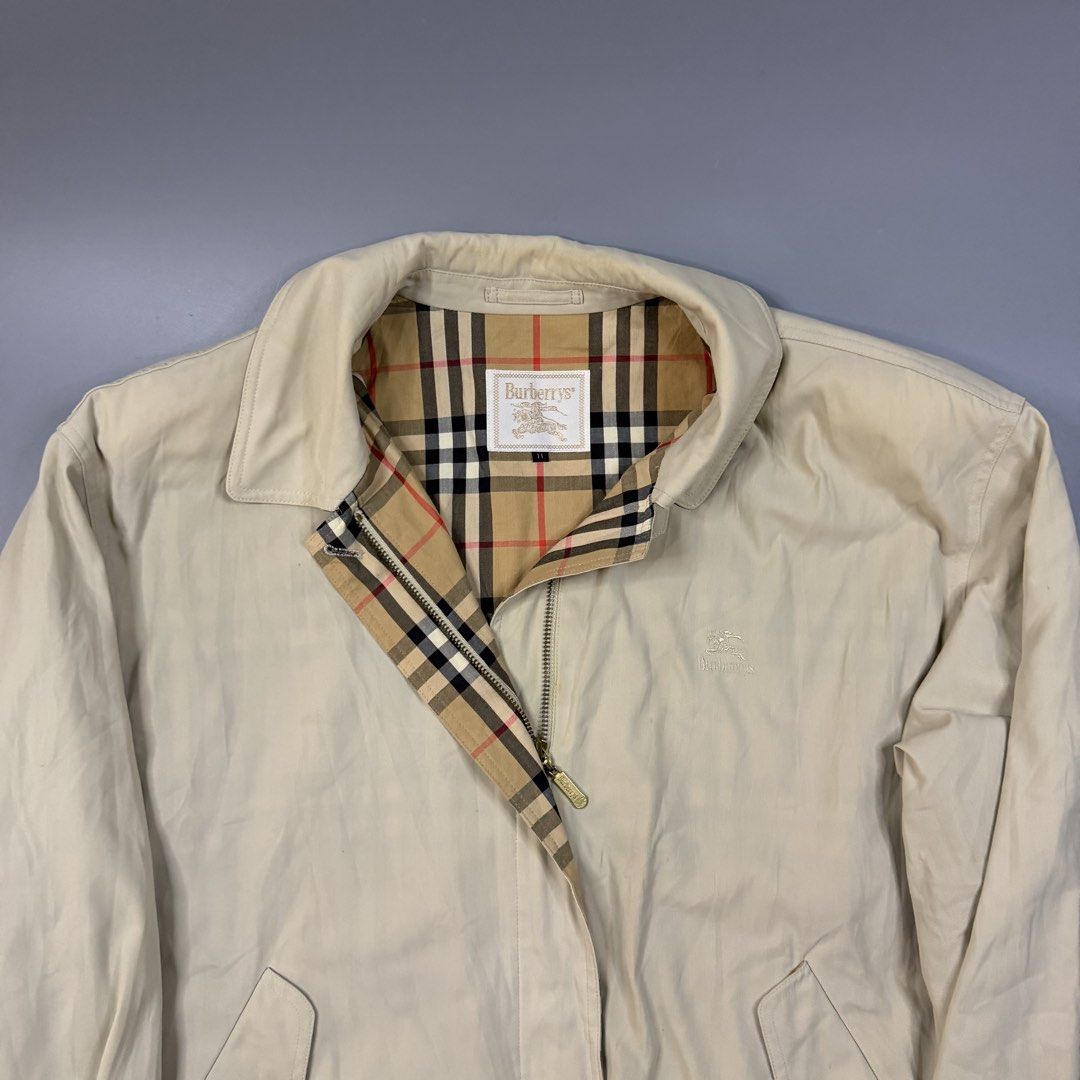 (Vintage) Burberry - Cream Harrington Jacket (Category: Coats, Jackets and Outerwear) located in Paranaque City. Submitted by millennial_goodz (Listing ID 1470906837, Image 2). Description: WTS (Vintage) Burberry - Cream Harrington Jacket Size 2 Dimensions: 24" / 26" -- 21" Sleeves Excellent condition Flaw: Minimal washable stain Authentic DM.