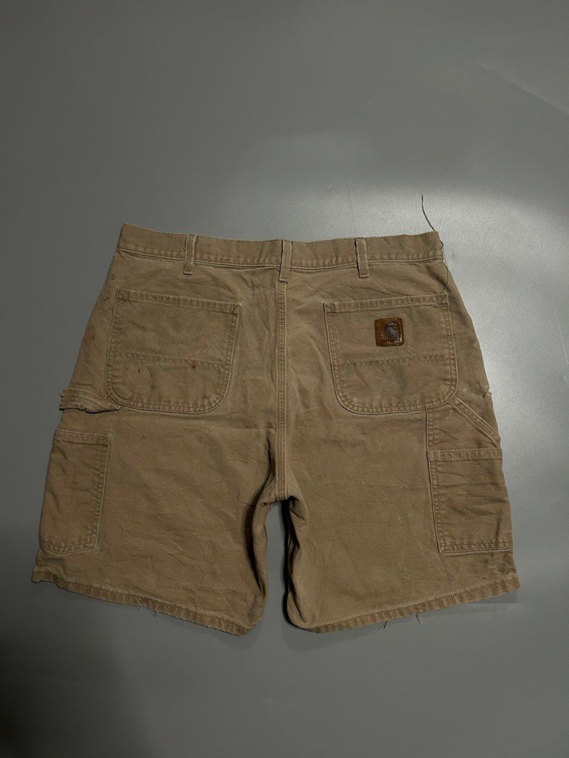 Vintage carhartt bigpatch carpenter jorts (authentic) (Category: Shorts) located in Trece Martires City. Submitted by flip_flips (Listing ID 1470894485, Image 2). Description: Vintage carhartt bigpatch carpenter jorts (authentic) -Dimes: 34 waist 21 length 14.5 tigh 12 leg open -Good vintage condition -9.3/10 color rate -issue: distress parts, minor stains on pocket.
