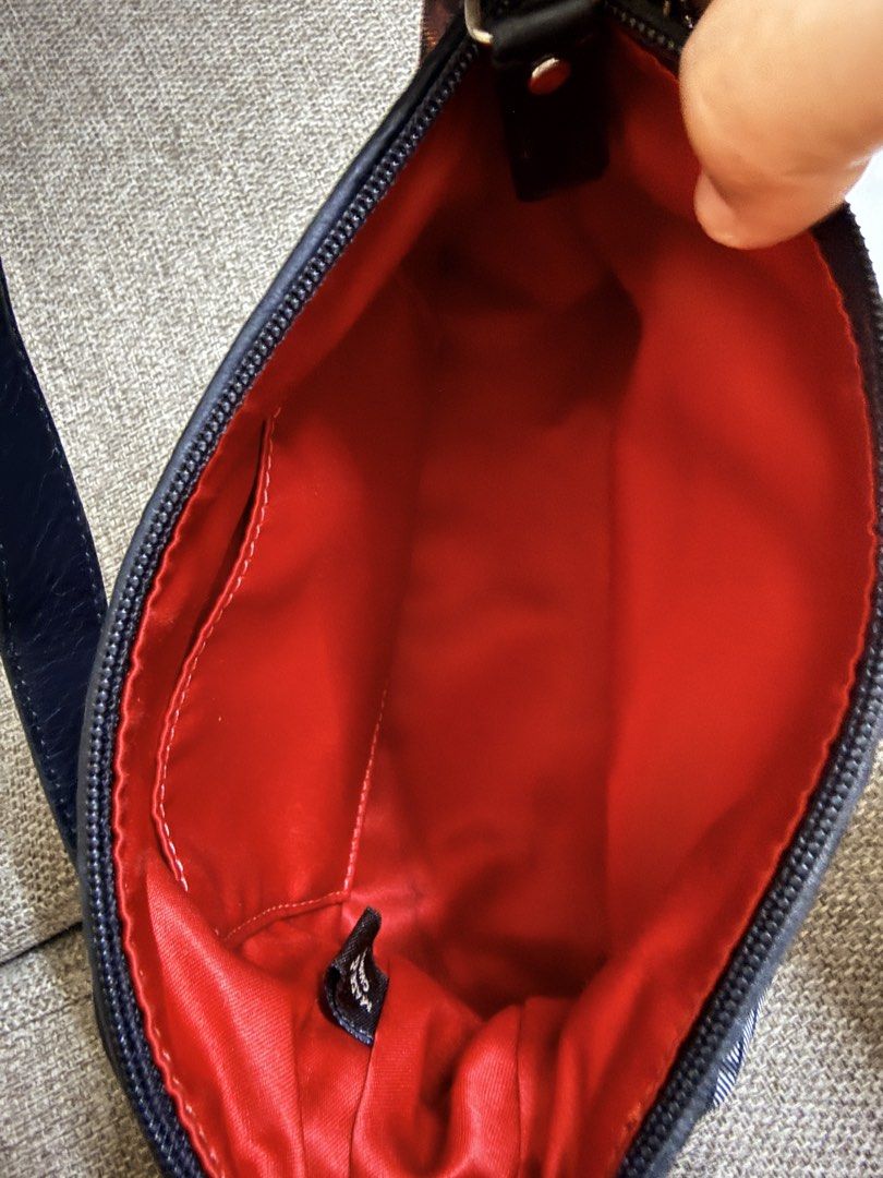 Vintage Coach Poppy (Category: Shoulder Bags) located in Marikina City. Submitted by anndergroundmarket (Listing ID 1470777142, Image 2). Description: Coach Poppy red and black tartan plaid signature shoulder bag with a black handle and silver hardware. Red and dark grey tartan plaid combined with the signature Coach “C” watermark print.