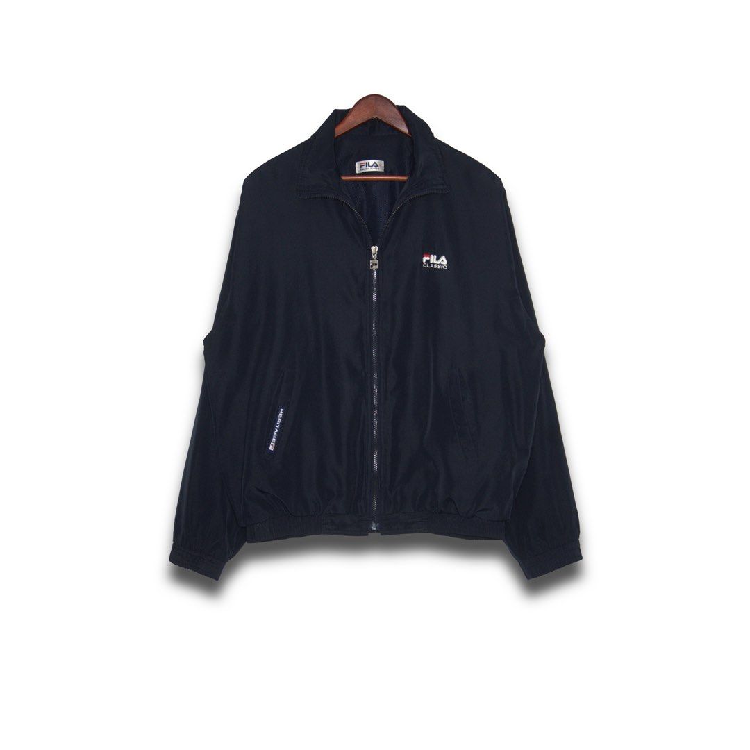 Fila Windbreaker Jacket (Category: Coats, Jackets and Outerwear) located in Davao. Submitted by justin_sells (Listing ID 1470803366, Image 1). Description: -Fila Classic Windbreaker -Lightweight fabric, ideal for breezy weather -Small Classic embroidery on the left chest, Bold Fila Classic logo printed across the back.