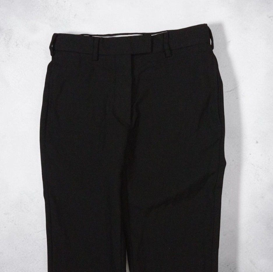 Vintage Helmut Lang Wool Trouser (Category: Other Bottoms) located in Manila. Submitted by grmnts_frmthe_slmz (Listing ID 1470843780, Image 2). Description: Simple black trousers. Tailored cut with belt loops. Zipper pull stamped with Elite. Standard straight leg style, easy to match with any top for work or casual outings. Fabric is clean and solid black. HELMUT LANG BY ALEXANDER MCQUEEN WOOL TROUSER Sizes: Small to Medium (38) Dimes: 13 inches,