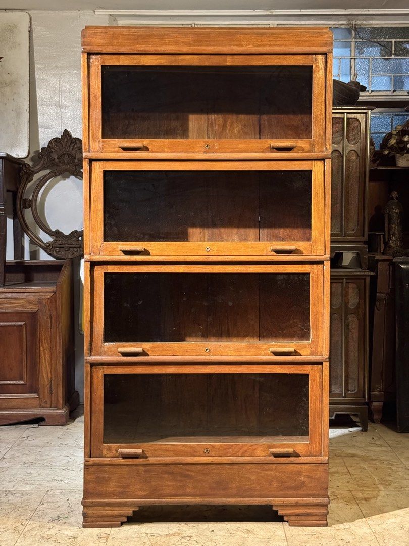 Vintage Narra Bookshelf Bookcase (Category: Vintage Collectibles) located in Manila. Submitted by sinaunang_gamit (Listing ID 1470770987, Image 3). Description: Vintage Narra Bookshelf Bookcase Height: 68 inches Length: 34 inches Width: 11 inches Solid Narra Loc: 6th ave caloocan ₱16k.