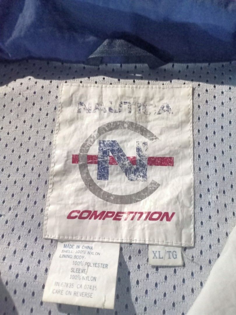 Vintage Nautica (Category: Coats, Jackets and Outerwear) located in Pasig City. Submitted by thrifttofit (Listing ID 1470761506, Image 3). Description: Vintage 1990's Nautica Competition Color - Blocked Windbreaker Jacket Autentic 100% Condition 9/10 Size XL ontag! No issue need wash only 1,250+Sf.