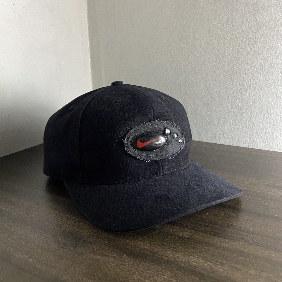 Vintage Nike Air Oval Logo Cap (Category: Caps & Hats) located in Manila. Submitted by curatedvg. (Listing ID 1470846243, Image 1). Description: Vintage Nike Air Oval Logo Cap Adult Fitting Velcro (with swoosh engraved) Free Size Flaws: minor signs of wear Color Rate: 9.5/10 (black) Condition: LIGHTLY USED COLOR MAY VARY DUE TO LIGHTING! Helping a friend ❗️.