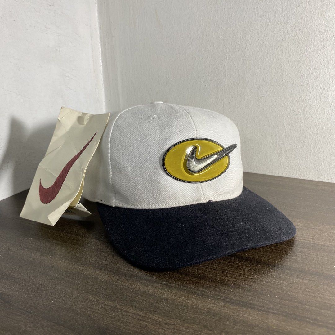 Vintage Nike Oval Bubble Logo Cap (Category: Caps & Hats) located in Manila. Submitted by curatedvg. (Listing ID 1470847816, Image 1). Description: Vintage Nike Oval Bubble Logo Cap Adult Fitting Velcro (with swoosh engraved) Free Size Flaws: sweat stains & signs of wear Color Rate: 9/10 (white) Condition: WELL USED COLOR MAY VARY DUE TO LIGHTING! Helping a friend❗️.