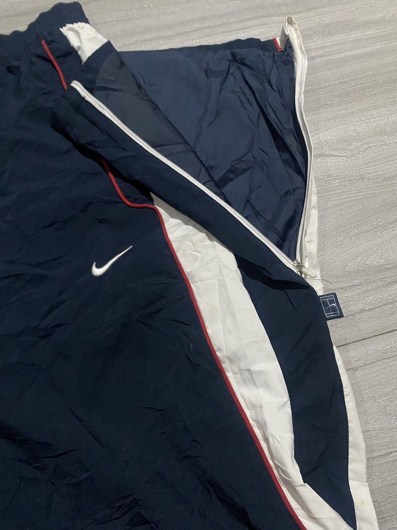 Vintage nike track pants (Category: Joggers) located in Bacolod City. Submitted by bnta_bounce (Listing ID 1470873273, Image 3). Description: Flaws:minimal stain / washable Length 39 Waist 30-37 Leg hole 10.