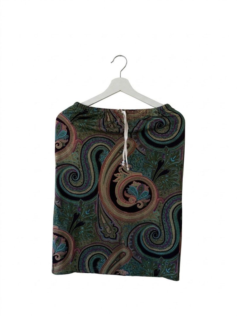 Vintage Paisley Print Drawstring Skirt (Category: Skirts) located in Taguig. Submitted by luxeria_ (Listing ID 1470782491, Image 1). Description: - Color: Green and black with all-over paisley print - Waist: Elastic with white adjustable drawstring - Length: Knee-length - Fabric: Lightweight and breathable - Style: Casual, easy to mix and match.