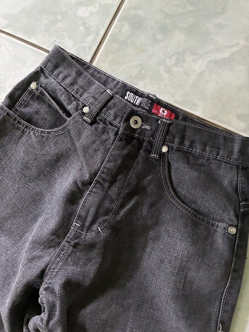 Vintage Southpole Embroidered Sneaker Jeans (Category: Jeans) located in Batangas. Submitted by jinventoryarchive (Listing ID 1470870829, Image 3). Description: Negotiable Brand: Southpole - Size: 12 - Color: Dark grey denim - Fit: Relaxed fit with a button fly and classic 5-pocket design - Details: Contrast stitching throughout and fun embroidered graphics on the back pockets - Condition: Clean hems, solid construction, and ready to wear.
