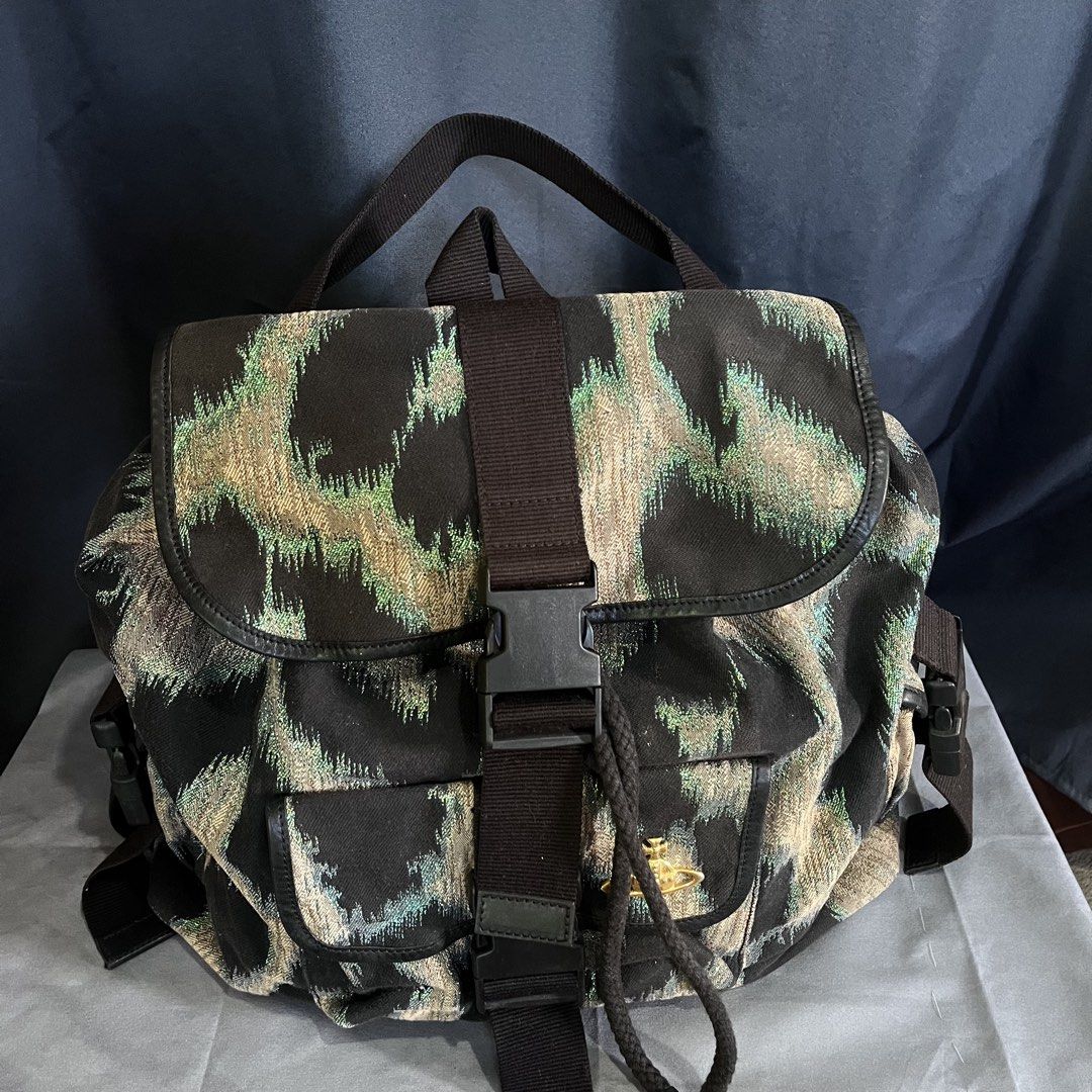 VIVIENNE WESTWOOD HIGHLAND BACKPACK (Category: Luxury Bags & Wallets) located in Taguig. Submitted by maniladept. (Listing ID 1470785628, Image 3). Description: VIVIENNE WESTWOOD HIGHLAND BACKPACK AUTHENTIC LENGTH:12 WIDTH:17 OPTI ZIPPER AS NEW CONDITION COLOR MAY VARY DUE TO LIGHTING NO FLAWS ITEM ONLY NEGOTIABLE DM.