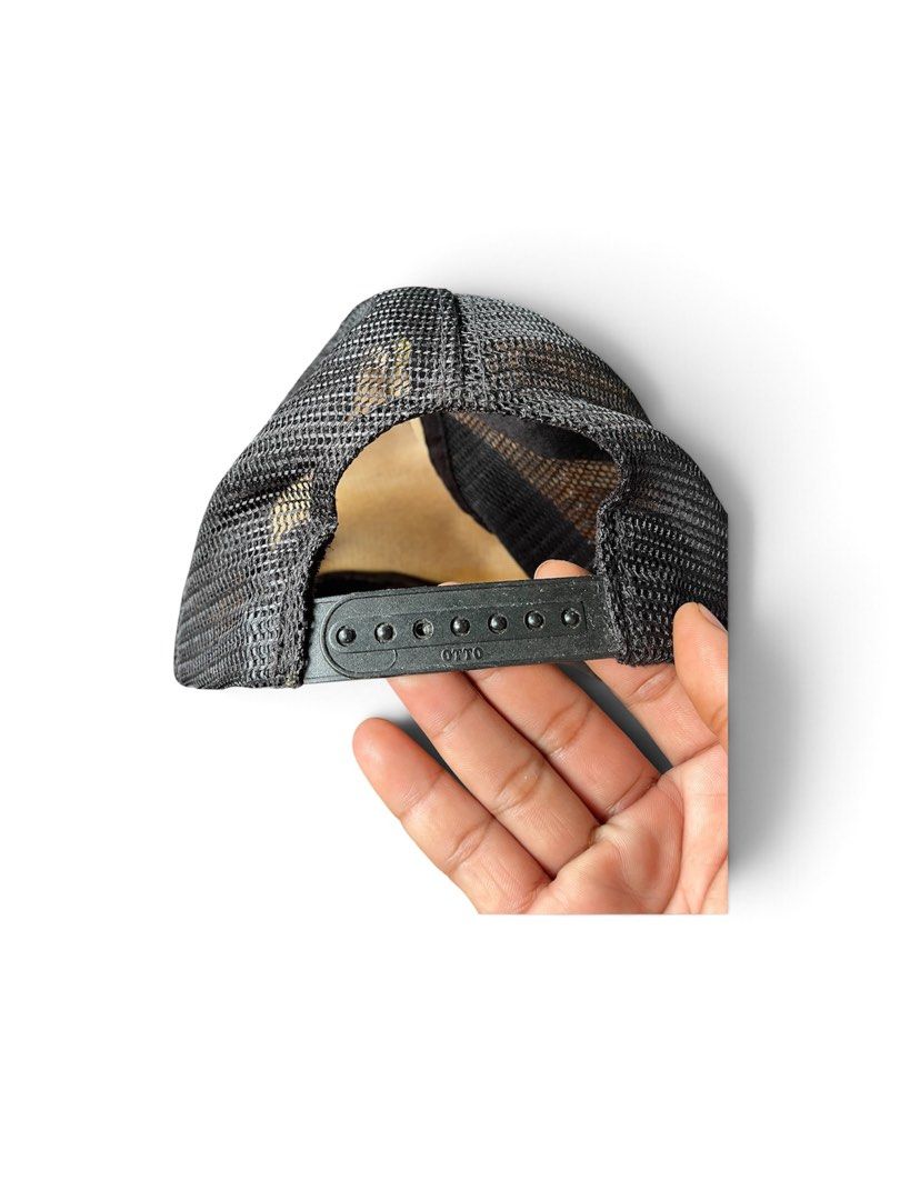 Vintage Volcom Tour Trucker Hat Otto Snapback (Category: Caps & Hats) located in Nabua. Submitted by lastthrift2.0 (Listing ID 1470873328, Image 2). Description: •Vintage condition - Style: Black trucker hat with mesh back panels for breathability - Design: Volcom Tour graphic printed on the front - Closure: Adjustable plastic snapback with Otto branding - Condition: Yellowing on the inside foam lining from age and wear; faded and stained inner t