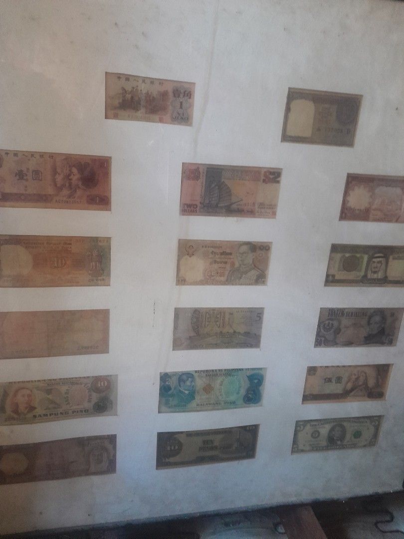 Vintage World Banknote Currency Collection Display (Category: Currency) located in Paranaque City. Submitted by dimaguilaa24827 (Listing ID 1470784136, Image 1). Description: - Collection of various international banknotes - Includes different countries and historical time periods pm if int - Features a variety of denominations and currencies - Stored flat inside protective sheets - Great starter set for currency enthusiasts or unique display pie