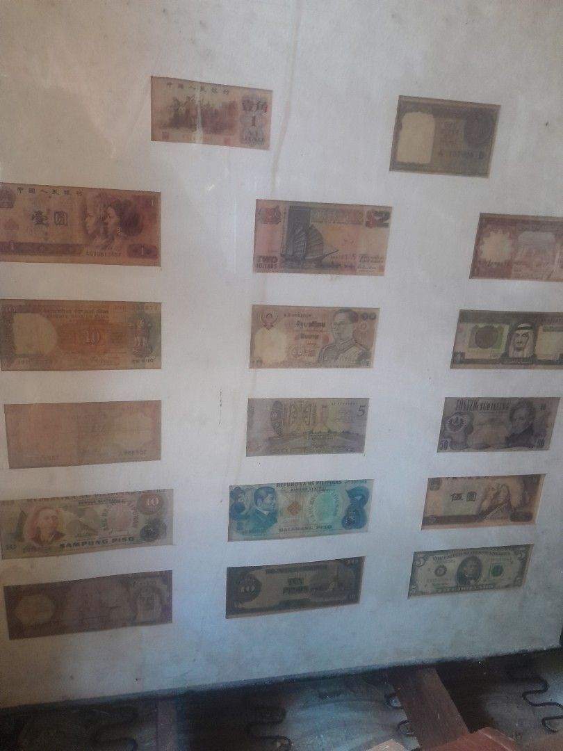 Vintage World Banknote Currency Collection Display (Category: Currency) located in Paranaque City. Submitted by dimaguilaa24827 (Listing ID 1470784136, Image 2). Description: - Collection of various international banknotes - Includes different countries and historical time periods pm if int - Features a variety of denominations and currencies - Stored flat inside protective sheets - Great starter set for currency enthusiasts or unique display pie