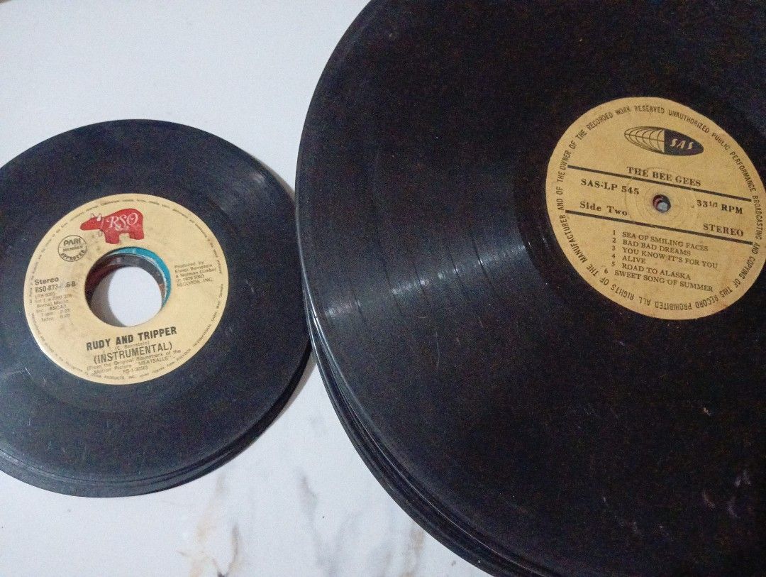 Vinyls and cassette tapes (Category: Vintage Collectibles) located in Manila. Submitted by snj0108 (Listing ID 1470894332, Image 1). Description: VINTAGE ITEMS/COLLECTIBLES 🎶 ✅ HOUSE DISPLAY / ROOM DECOR ✅ COFFEE SHOP DISPLAY / VINTAGE SHOP Pricelist: •The Bee Gees Vinyl record- ₱500 •7-inch records - ₱50/pc •12-inch records -₱100/pc •Cassette tape -₱100/pc.
