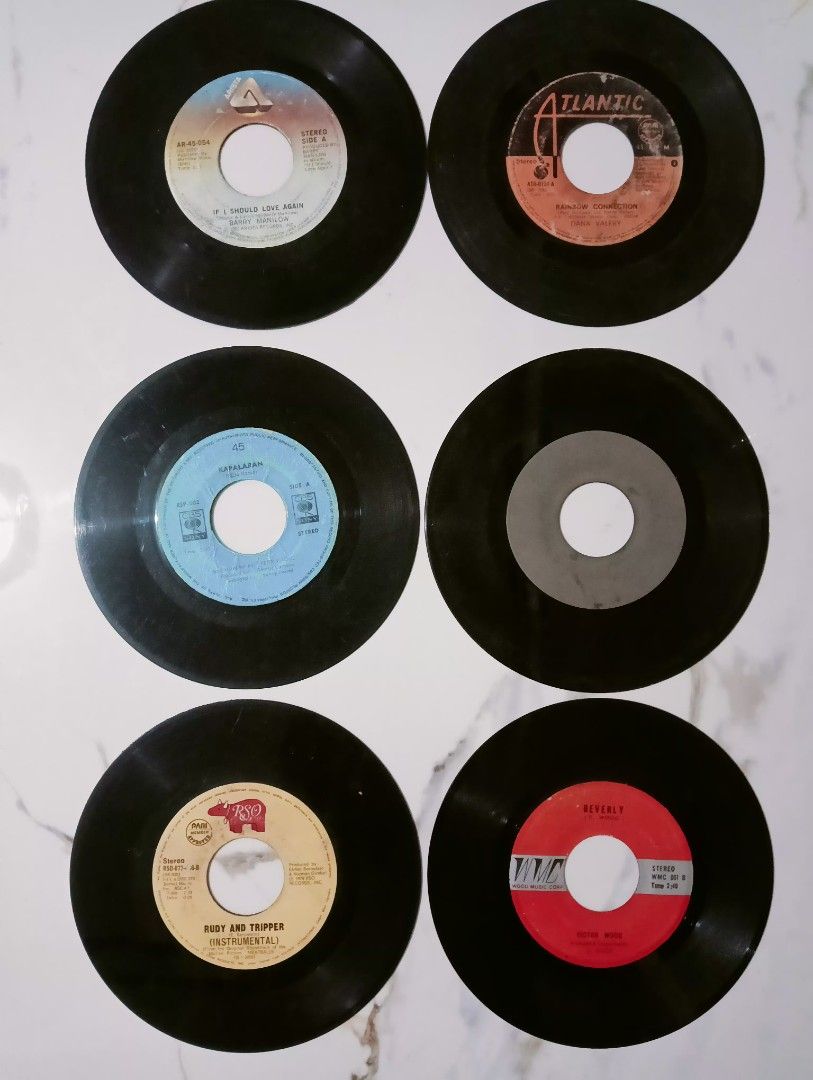 Vinyls and cassette tapes (Category: Vintage Collectibles) located in Manila. Submitted by snj0108 (Listing ID 1470894332, Image 2). Description: VINTAGE ITEMS/COLLECTIBLES 🎶 ✅ HOUSE DISPLAY / ROOM DECOR ✅ COFFEE SHOP DISPLAY / VINTAGE SHOP Pricelist: •The Bee Gees Vinyl record- ₱500 •7-inch records - ₱50/pc •12-inch records -₱100/pc •Cassette tape -₱100/pc.