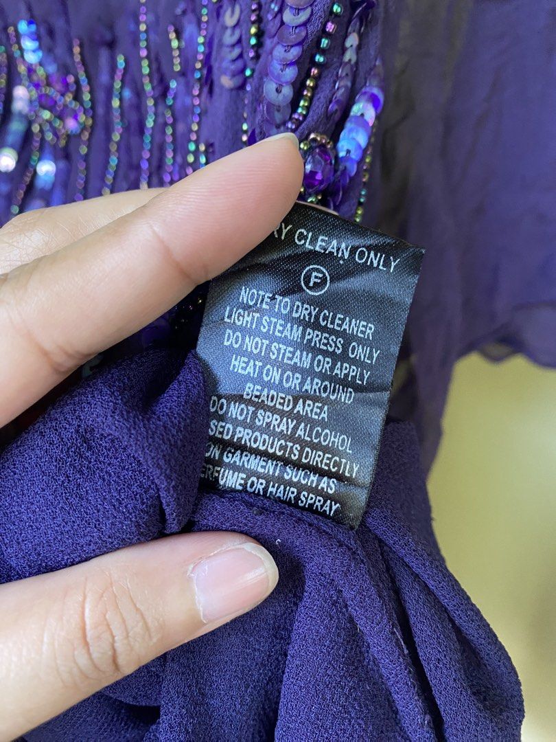Violet full sequin batwing like top (Category: Others Tops) located in Malaybalay. Submitted by thriftfindsbyshei-2nd (Listing ID 1470855942, Image 3). Description: Large-XL Flaw: missing sequins .