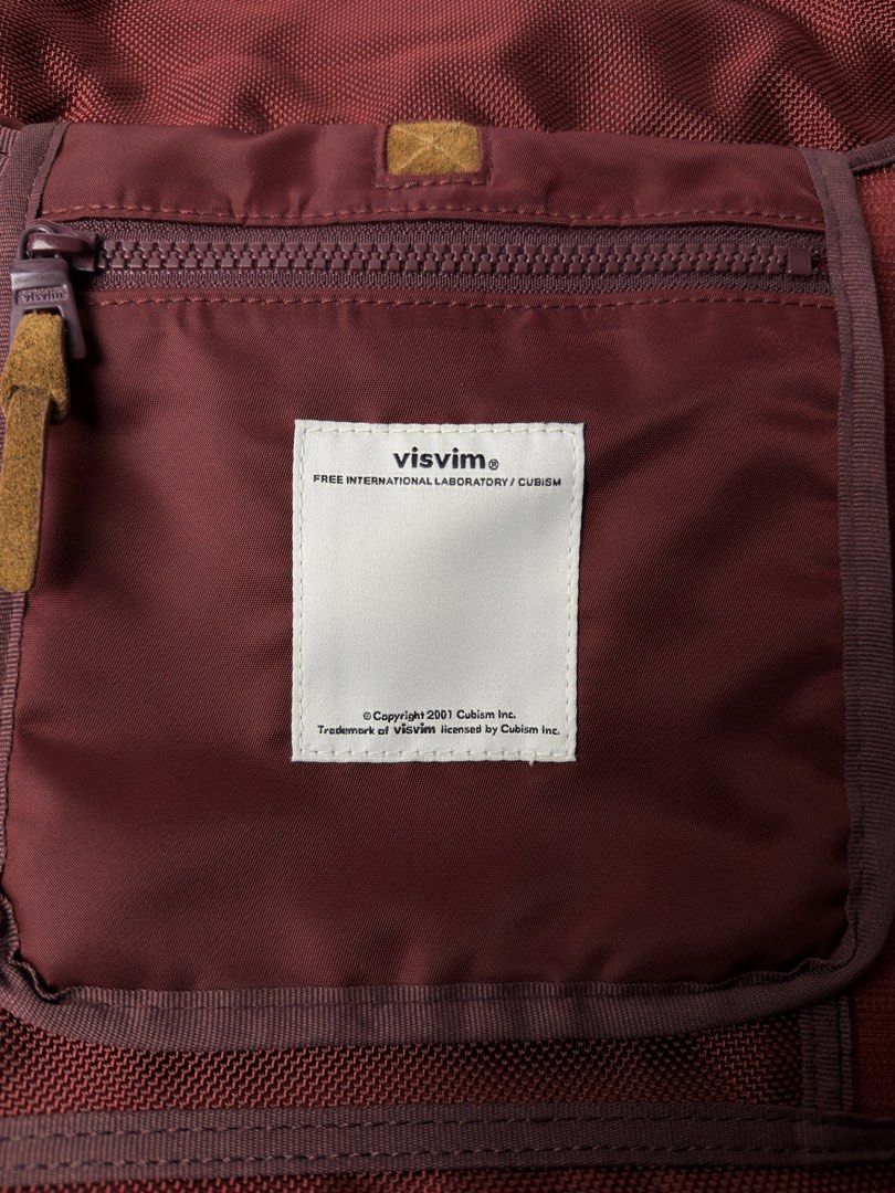 Visvim Ballistic E-Cat 18L Messenger Bag (Category: Belt bags, Clutches and Pouches) located in Manila. Submitted by streetsavvy (Listing ID 1470831870, Image 3). Description: Visvim Ballistic E-Cat 18L Messenger Bag Width: 16” Height: 13” Depth: 6” Strap Drop: 17” (Adjustable Strap) Measured in Inches Classic archival VISVIM Ballistic E-Cat Messenger Bag in a rare Burgundy/Maroon colorway. Constructed from ultra-durable Cordura® nylon paired wit