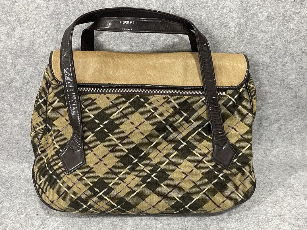 vivienne westwood (Category: Tote Bags) located in Calamba. Submitted by thriftingoverload (Listing ID 1470829898, Image 2). Description: plus shipping fee.