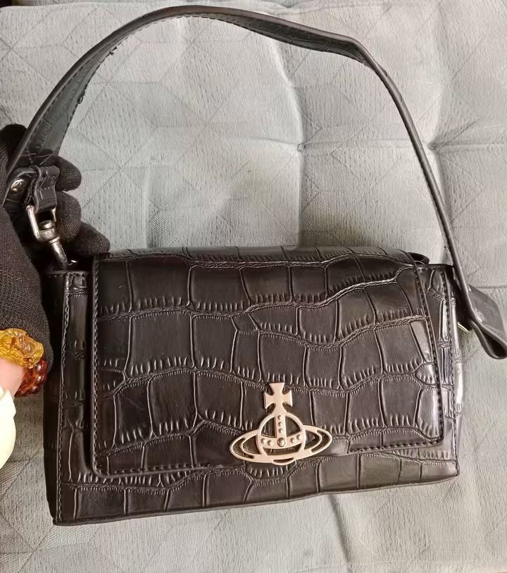 Vivienne Westwood croc (Category: Wallets & Card holders) located in Angeles City. Submitted by mjshoppingretail (Listing ID 1470856328, Image 1). Description: orig Vivienne Westwood like new.